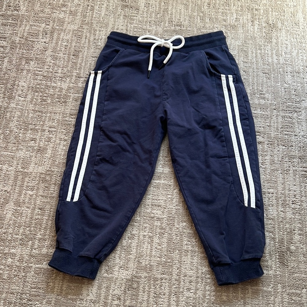 Calf length, navy sweat pants